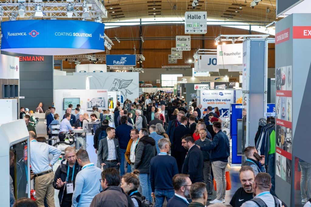 Gut gefüllte Hallen bei der PaintExpo, der Messe für Oberflächentechnik